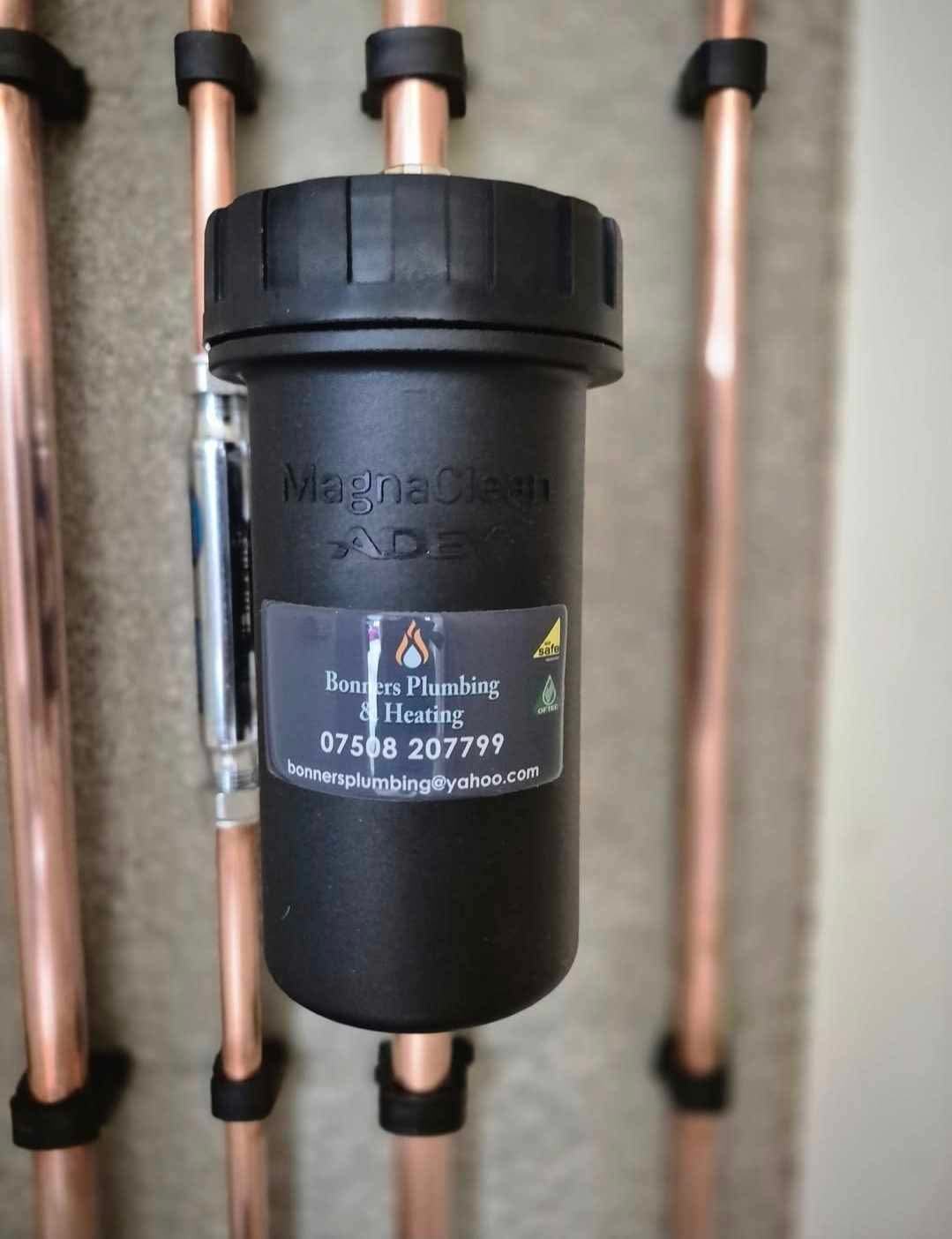 Branded Bonner's Plumbing & Heating MagnaClean filter installation